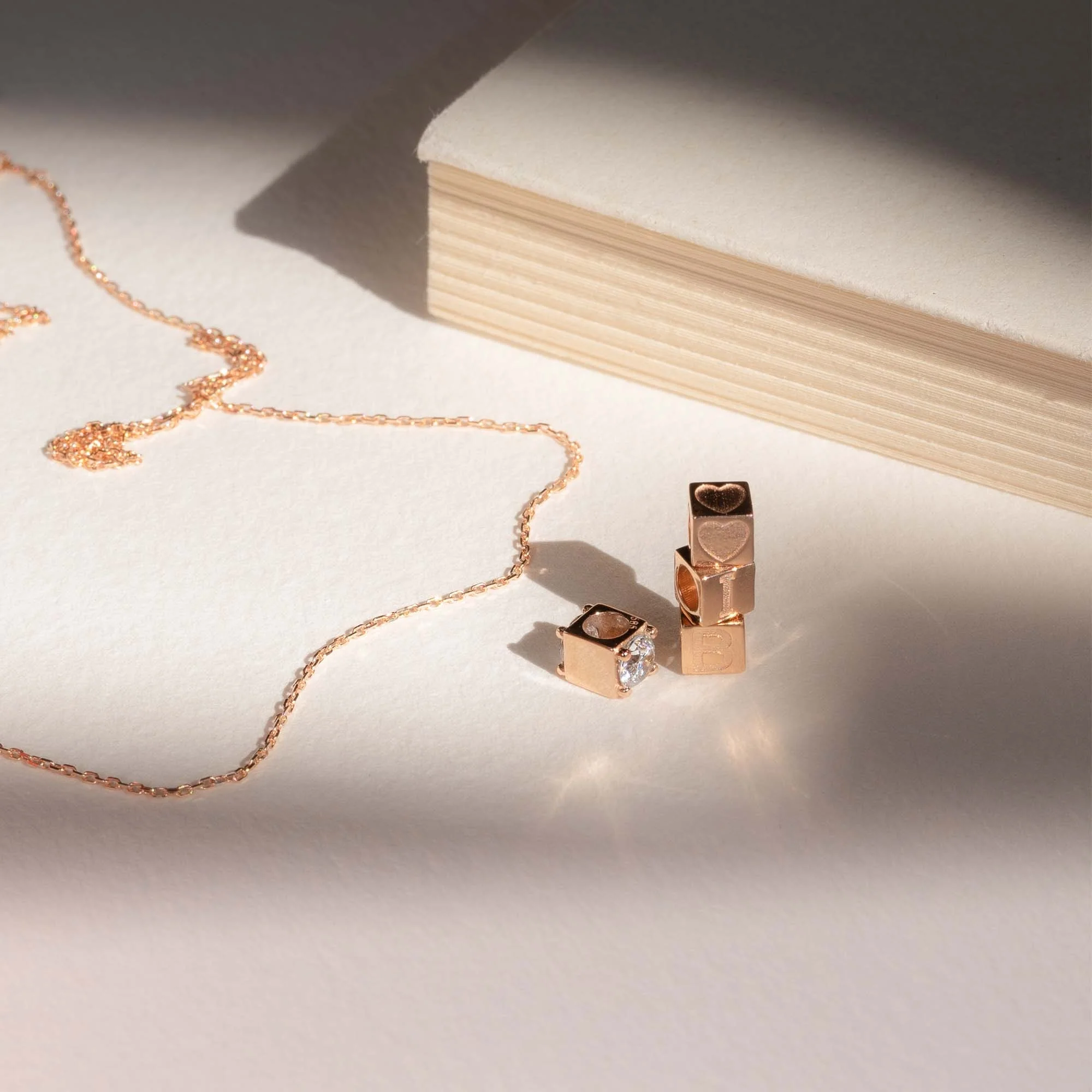 La Concorde Felie 14 karat rose gold cube charm with zirconia stone - Image 5
