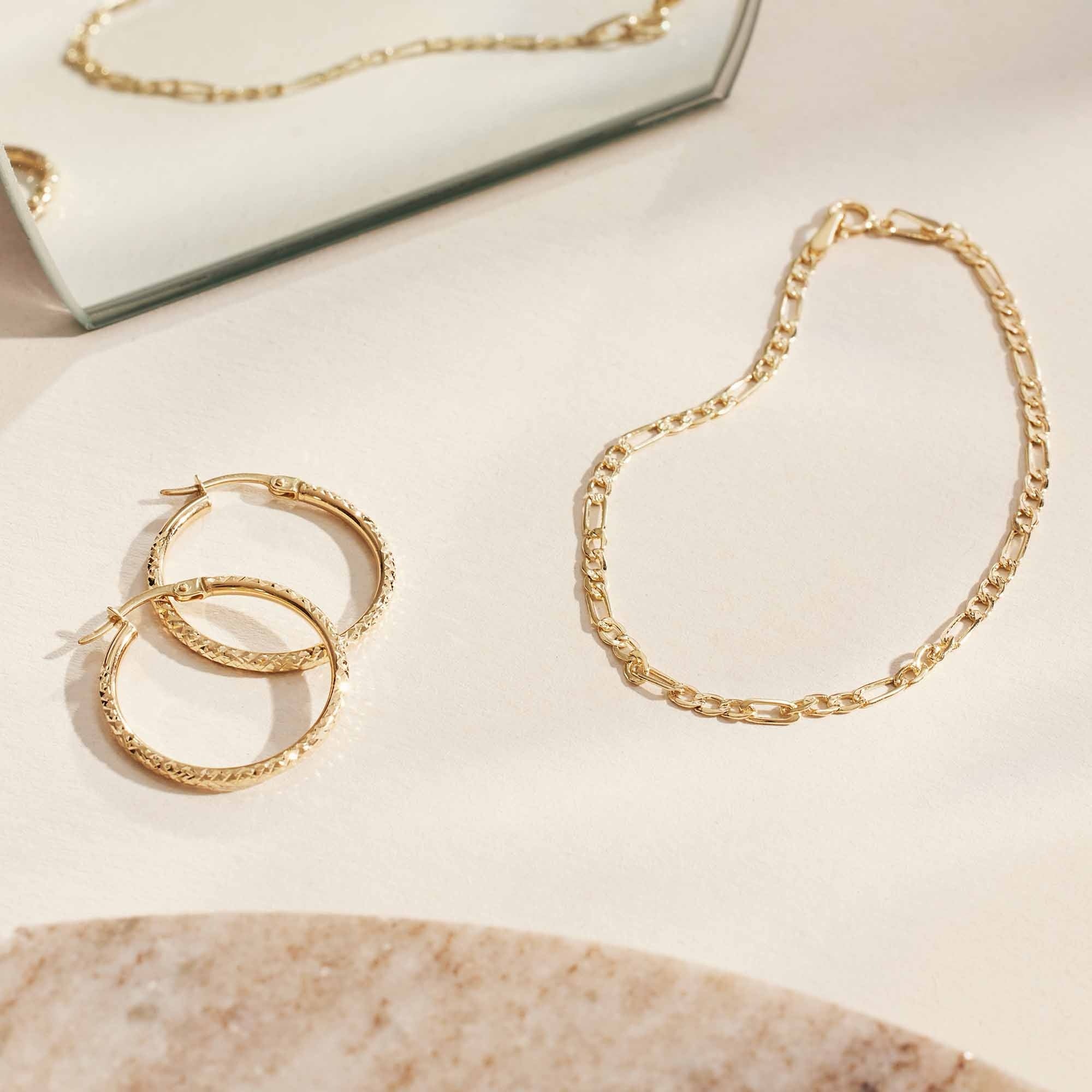 Rivoli Laura 14 karat gold hoop earrings with diamond cut - Image 4