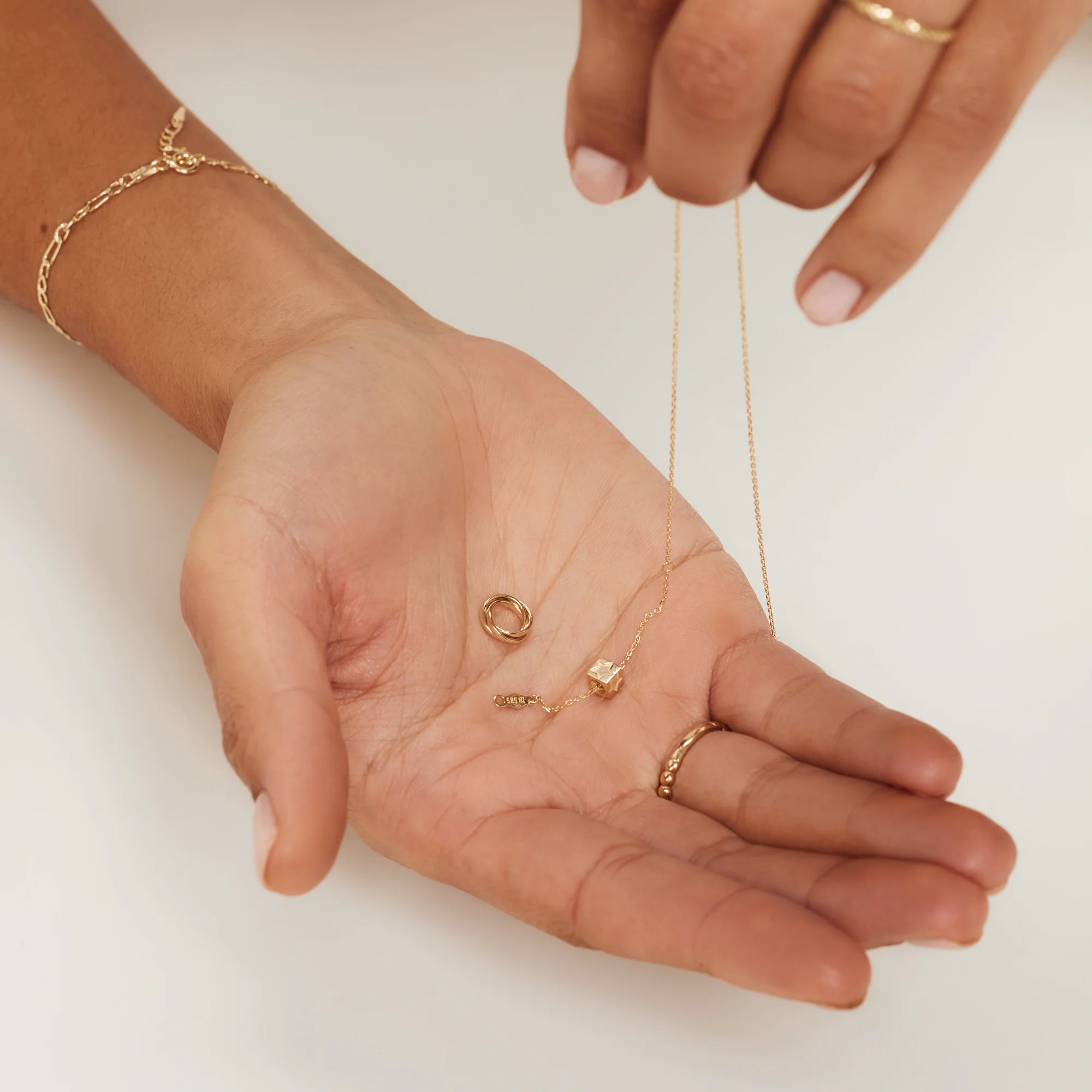 Le Marais Felie 14 karat gold cube charm with star - Image 7